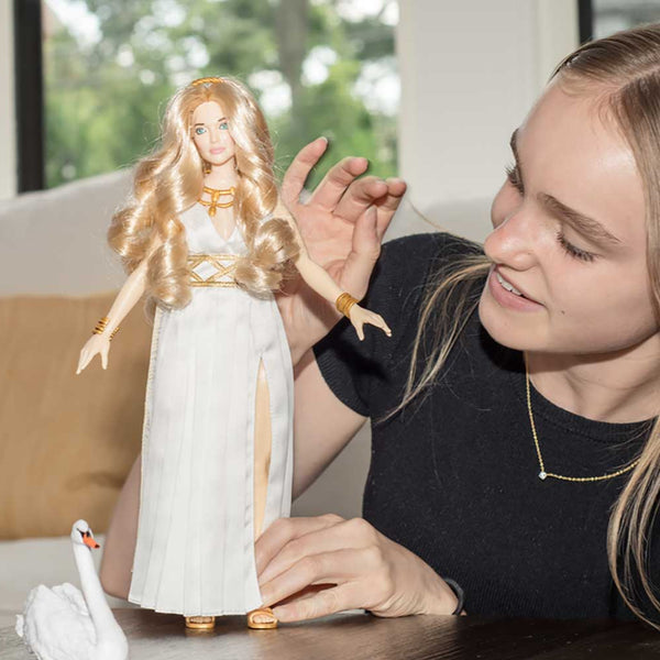Girl with Venus doll